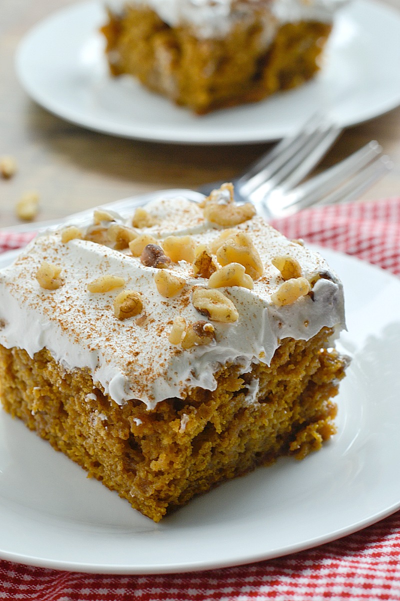 Love anything pumpkin spice? Then you are going to love this easy recipe for Better Than Anything Pumpkin Spice Cake that uses store bought spice cake mix and pumpkin puree and is soaked in condensed mix and caramel sauce and topped with cool whip. It's truly better than anything! 