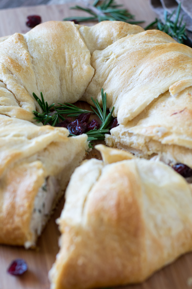 Get dinner ready in a snap with this delicious Rosemary Cranberry Chicken Crescent Ring made with just five simple ingredients!