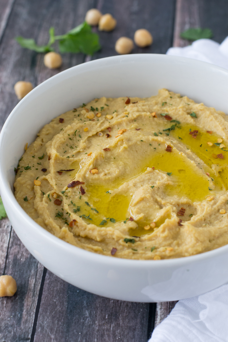 An easy and delicious recipes for creamy Mediterranean Hummus - no tahini required. | www.motherthyme.com