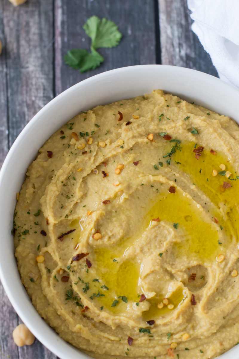 An easy and delicious recipes for creamy Mediterranean Hummus - no tahini required. | www.motherthyme.com