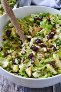 CRUNCHY BRUSSELS SPROUT SALAD WITH FRUIT AND NUTS